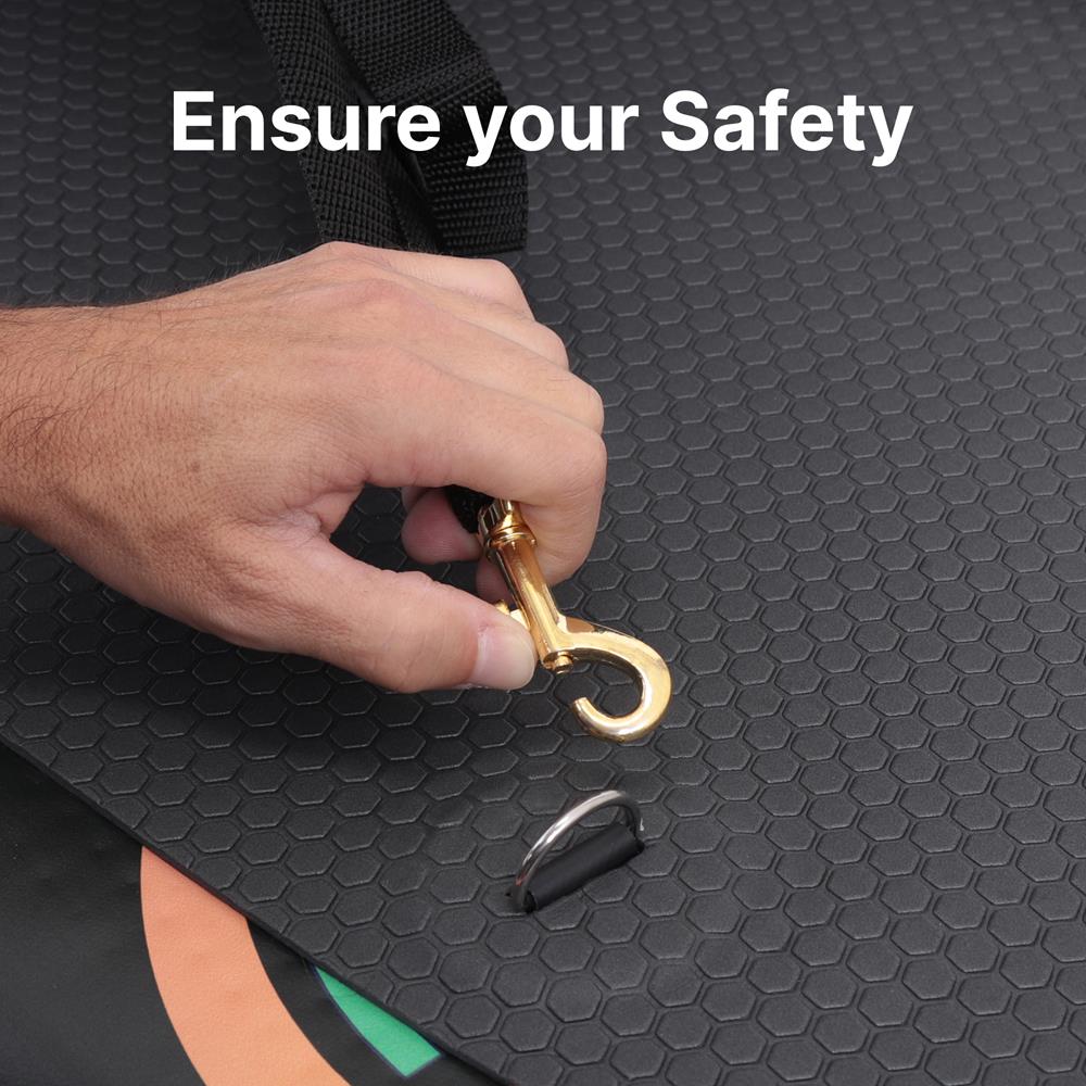 Hand holding a gold umbrella hook on a textured black surface with text 'Ensure your Safety'.